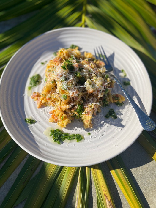 Creamy Pumpkin Fusilli with Bacon, Peas, Pecorino & Herbs